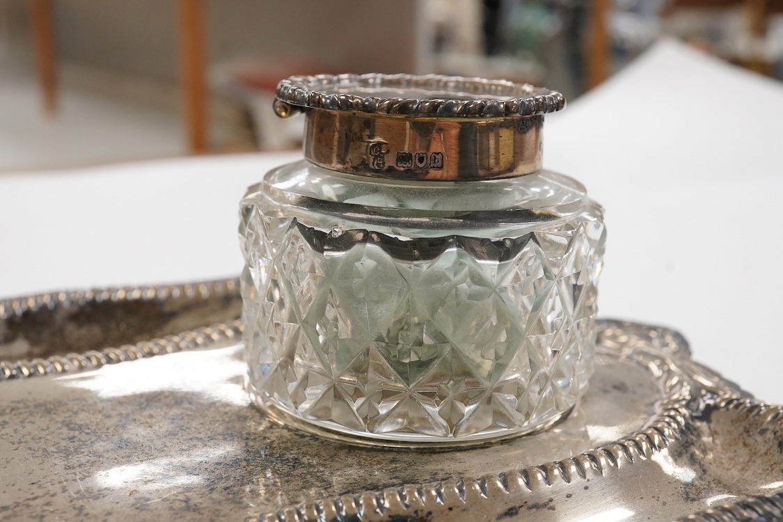 An Edwardian silver rectangular inkstand with two mounted glass wells, by Charles Stuart Harris, London, 1903, length 24.9cm, 12.2oz.
